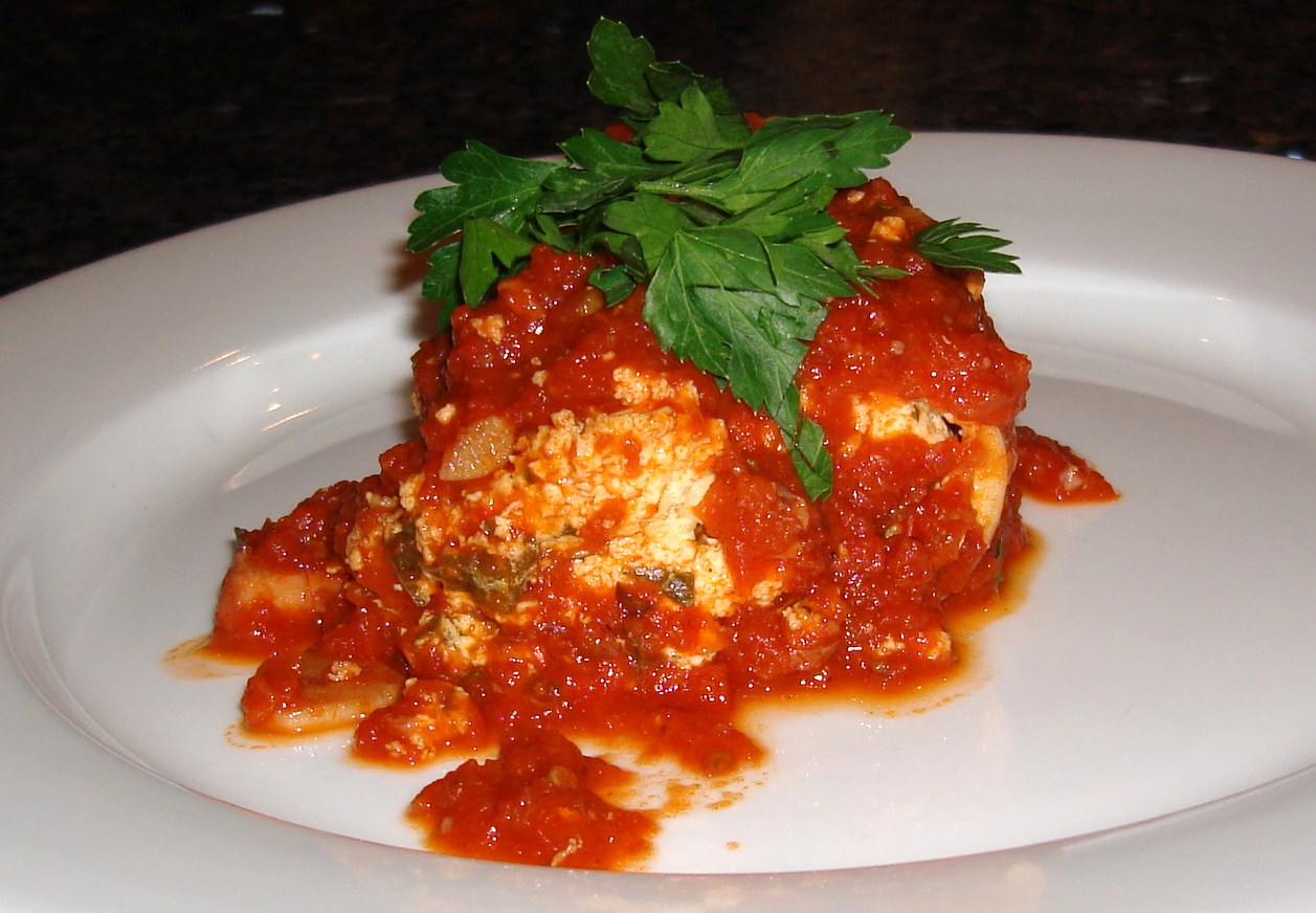 Calamari Ripieni alla Caprese made with jumbo Asian squid