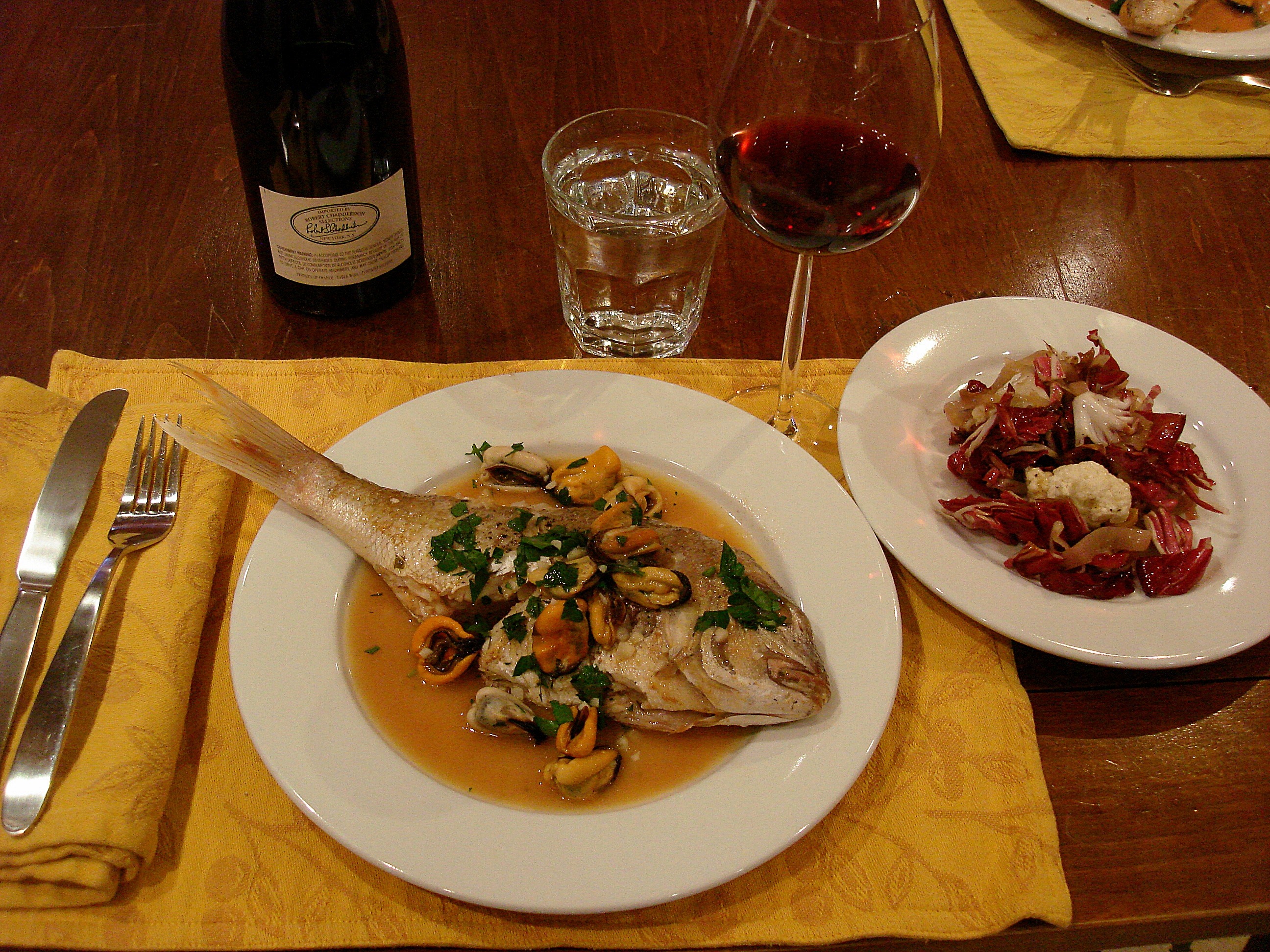 Red snapper with mussels, garlic and parsley