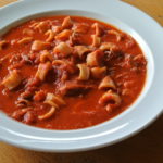 Calamari in umido (Squid braised in tomatoes and red chili)