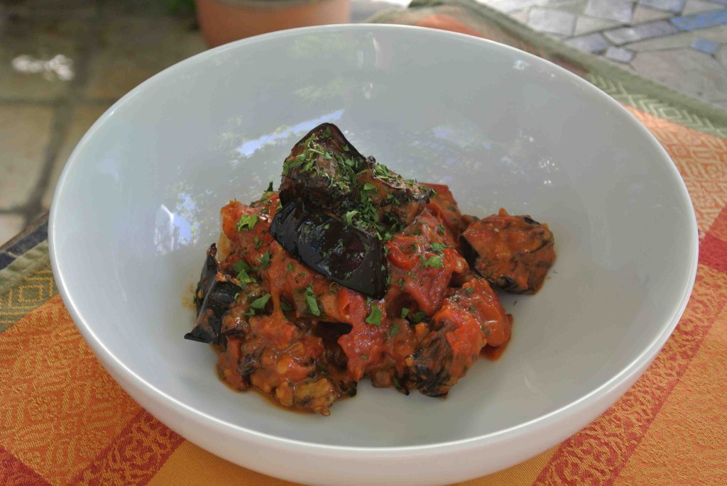 Chicken with pancetta, tomatoes and eggplant