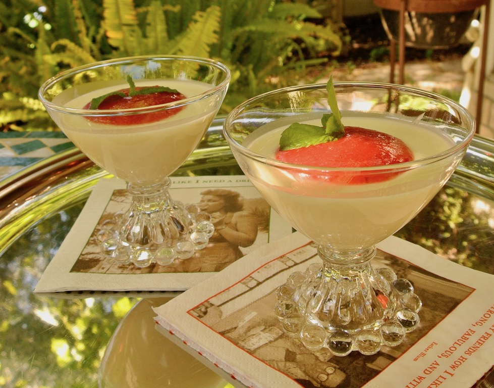 Basil and lemon infused panna cotta with strawberry sauce