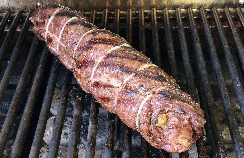 Grilled beef roll on the grill