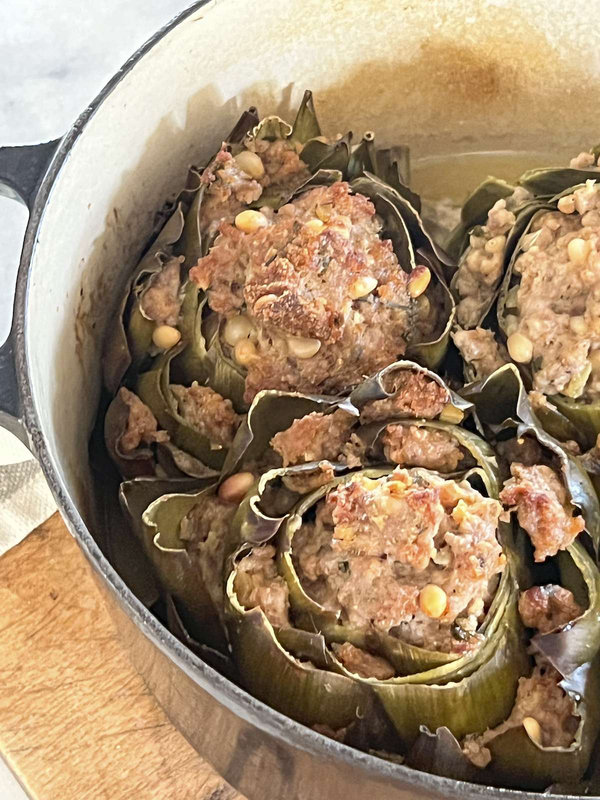 Sausage stuffed artichokes | OurItalianTable.com